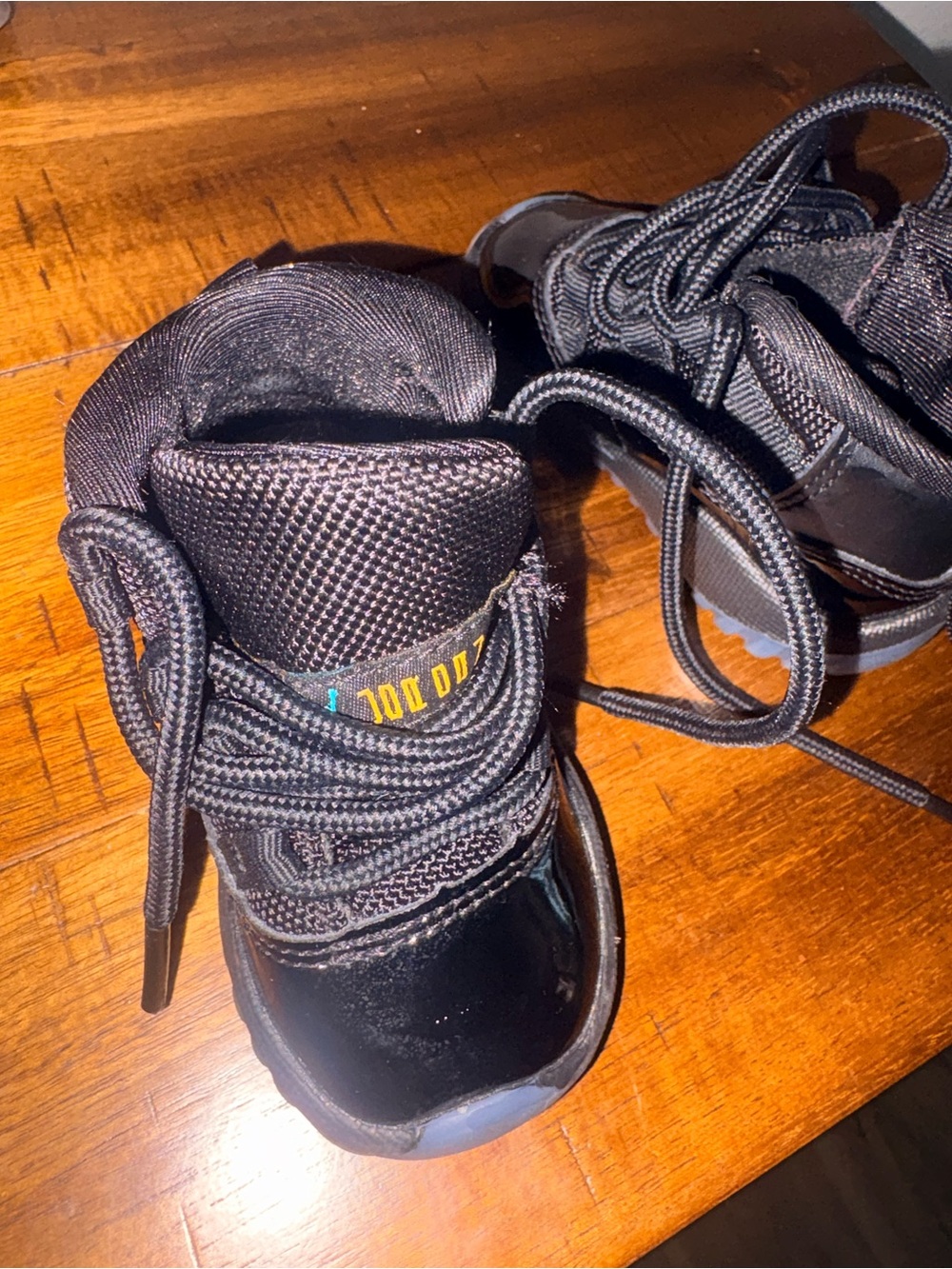 Jordan Kids Black High-Top Sneakers with Yellow Accent